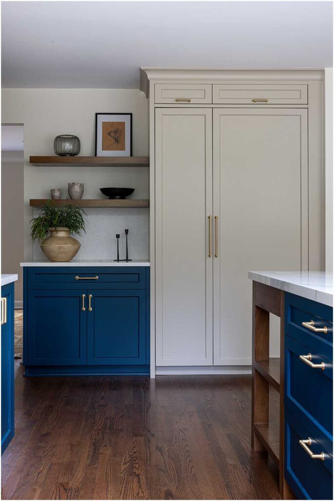 Hinsdale Kitchen Interior Design Blue cabinets with wood island and hidden refridgerator