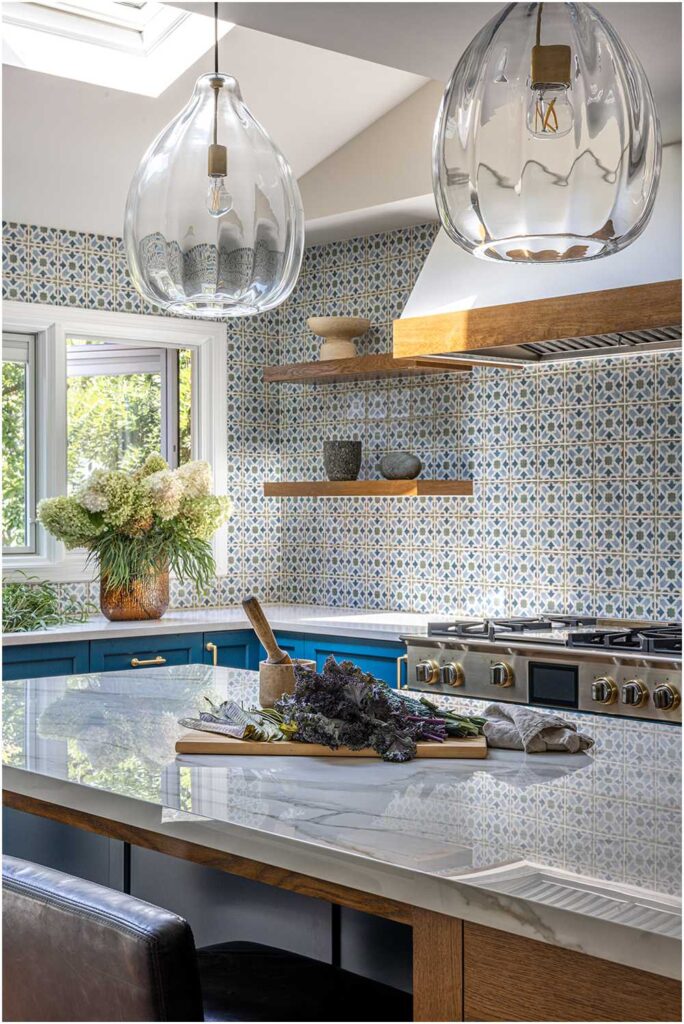 Hinsdale Kitchen Interior Design Blue cabinets with wood island and oversized pendant lights