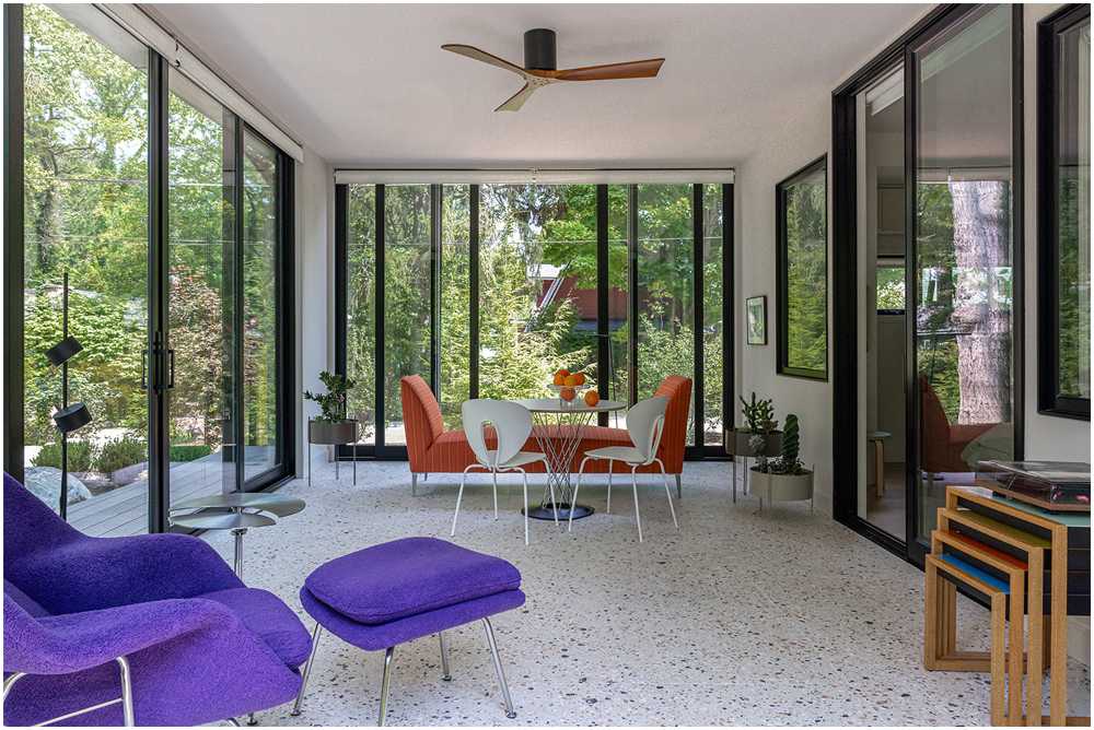 Midcentury modern kitchen four seasons room with bold furniture — interior design photography for designers